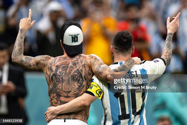 Lionel Messi of Argentina and Rodrigo De Paul of Argentina celebrate winning on penalties during the FIFA World Cup Qatar 2022 quarter final match...