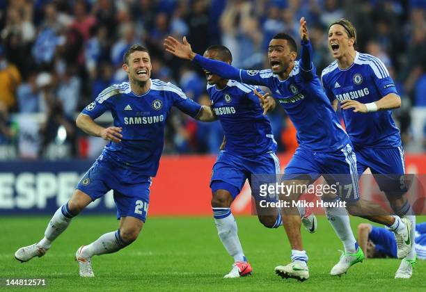 Gary Cahill, Florent Malouda, Jose Bosingwa and Fernando Torres of Chelsea celebrate after Didier Drogba scored the winning penalty during UEFA...