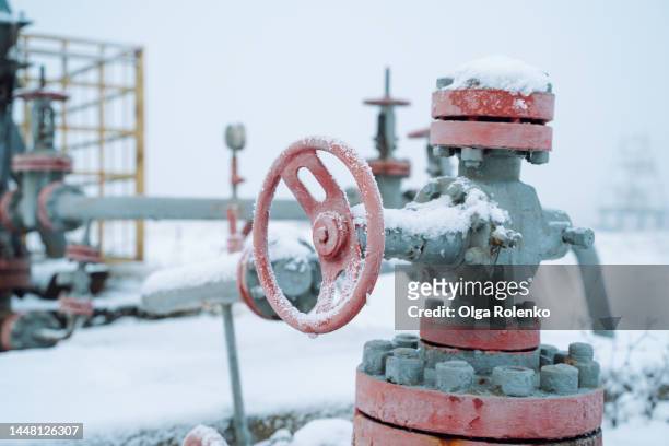 gasoline shortage, energy crisis in cold season. control of transportation and transmission of oil and gas in winter - frozen pipes stock pictures, royalty-free photos & images