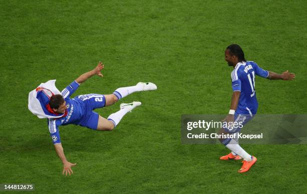 Didier Drogba of Chelsea celebrates with Branislav Ivanovic after scoring the winning penalty during UEFA Champions League Final between FC Bayern...