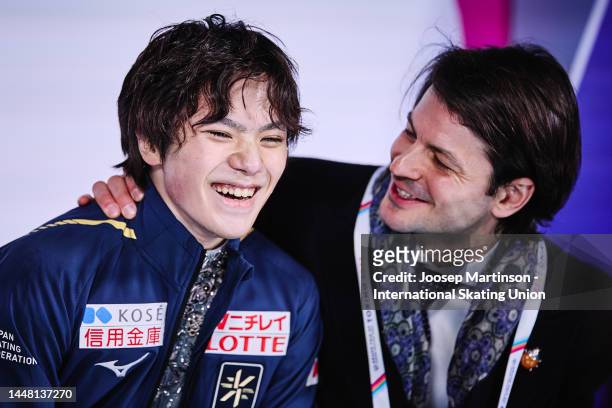 Shoma Uno of Japan reacts with coach Stephane Lambiel at the kiss and cry in the Men's Free Skating during the ISU Grand Prix of Figure Skating Final...
