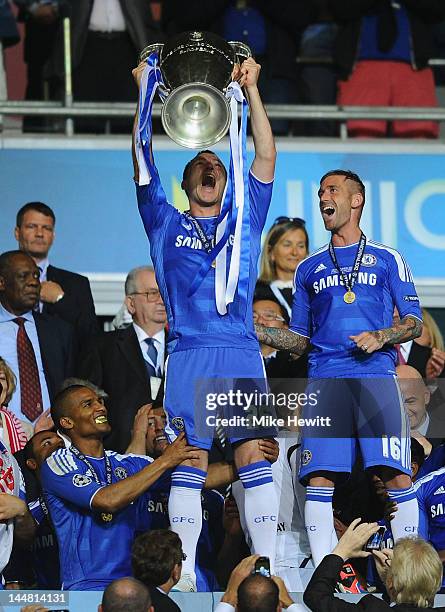 John Terry of Chelsea lifts the trophy in celebration after their victory in the UEFA Champions League Final between FC Bayern Muenchen and Chelsea...