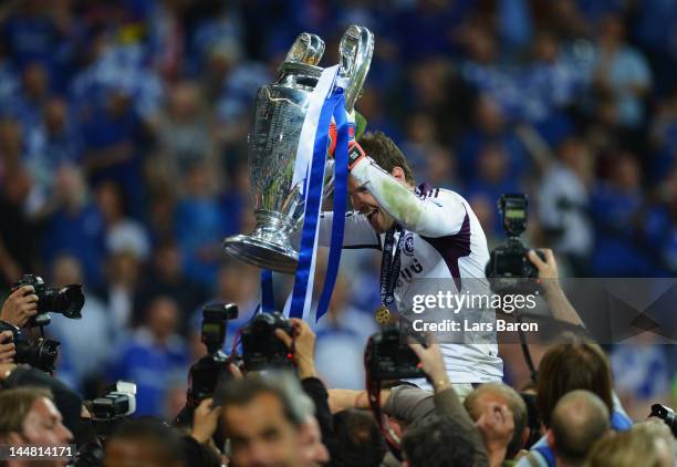 Petr Cech lifts the trophy in celebration after their victory in the UEFA Champions League Final between FC Bayern Muenchen and Chelsea at the...