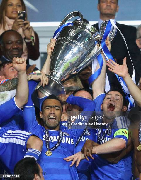 Frank Lampard and Jose Bosingwa of Chelsea lift the trophy in celebration after their victory in the UEFA Champions League Final between FC Bayern...