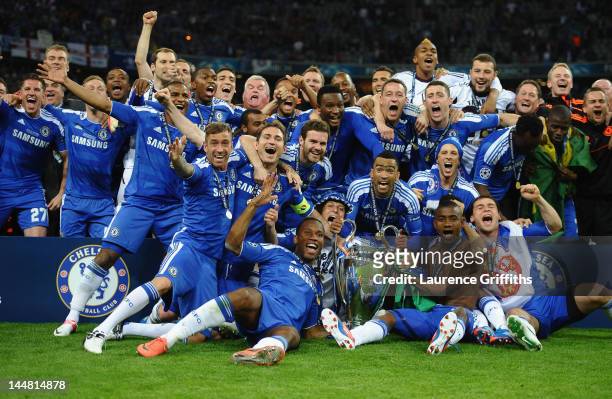 Chelsea players celebrate with the trophy after their victory in the UEFA Champions League Final between FC Bayern Muenchen and Chelsea at the...