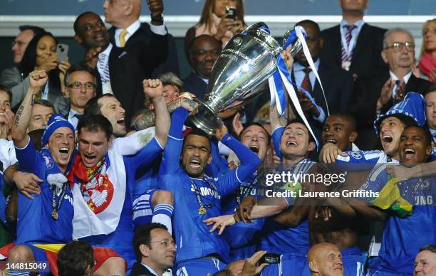 Jose Bosingwa of Chelsea lifts the trophy in celebration after their victory in the UEFA Champions League Final between FC Bayern Muenchen and...