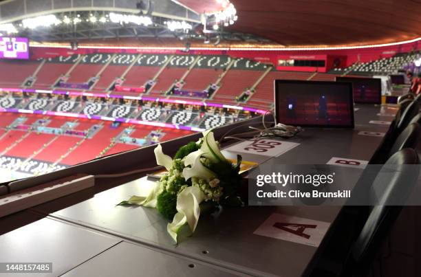 Flowers are placed in memory of Grant Wahl, an American sports journalist who passed away whilst reporting on the Argentina and Netherlands match,...