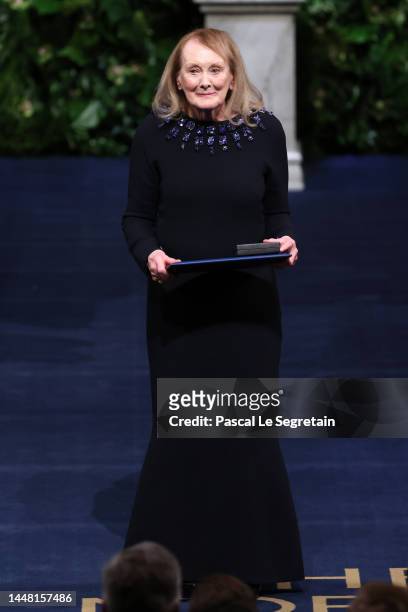 Annie Ernaux poses with the 2022 Nobel Prize in Literature during the Nobel Prize Awards Ceremony at Stockholm Concert Hall on December 10, 2022 in...