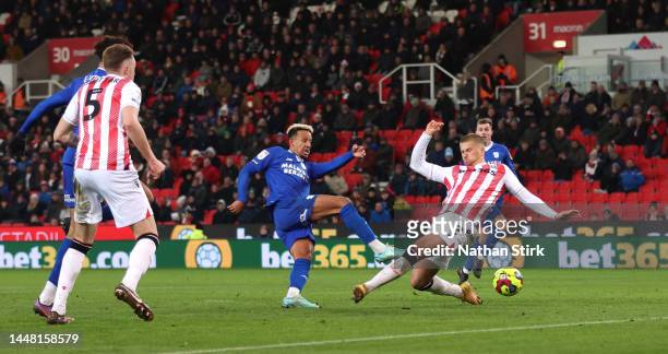 Callum Robinson of Cardiff City scores their second goal during the Sky Bet Championship between Stoke City and Cardiff City at Bet365 Stadium on...