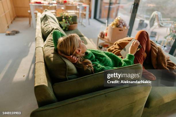 cozy winter afternoons - wrapped in a blanket stock pictures, royalty-free photos & images