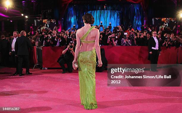 Milla Jovovich arrives for the Life Ball 2012 on May 19, 2012 in Vienna, Austria.