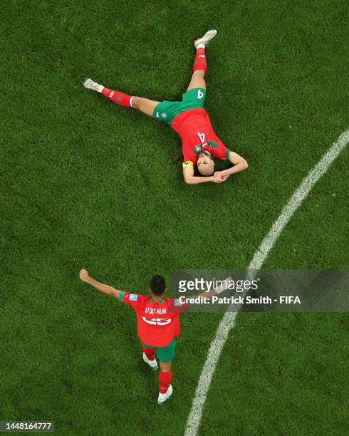 Yahya Attiat-Allah and Sofyan Amrabat of Morocco celebrate after the 1-0 win during the FIFA World Cup Qatar 2022 quarter final match between Morocco...