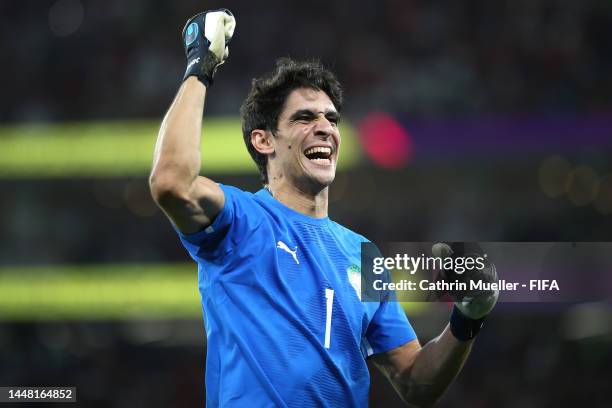 Yassine Bounou of Morocco celebrates the victory following the FIFA World Cup Qatar 2022 quarter final match between Morocco and Portugal at Al...