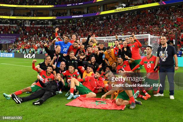 Morocco players celebrate after the 1-0 win during the FIFA World Cup Qatar 2022 quarter final match between Morocco and Portugal at Al Thumama...