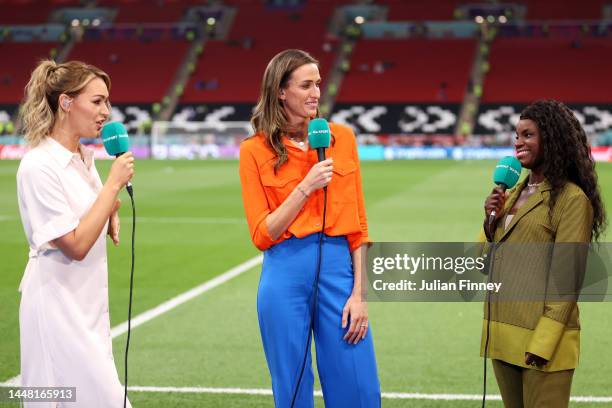 Laura Woods, Jill Scott and Eni Aluko of ITV Sport look on prior to the FIFA World Cup Qatar 2022 quarter final match between England and France at...