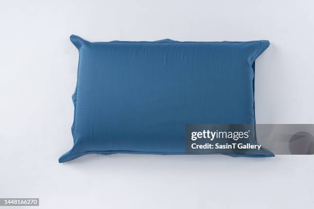 indigo blue pillow with case isolated on white background. - cuscino foto e immagini stock
