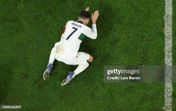 Cristiano Ronaldo of Portugal looks dejected after their sides' elimination from the tournament during the FIFA World Cup Qatar 2022 quarter final...