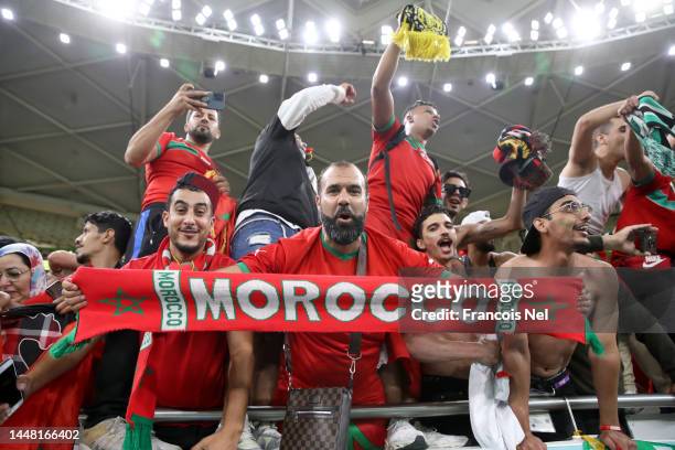 Morocco fans celebrate their team's 1-0 victory in the FIFA World Cup Qatar 2022 quarter final match between Morocco and Portugal at Al Thumama...
