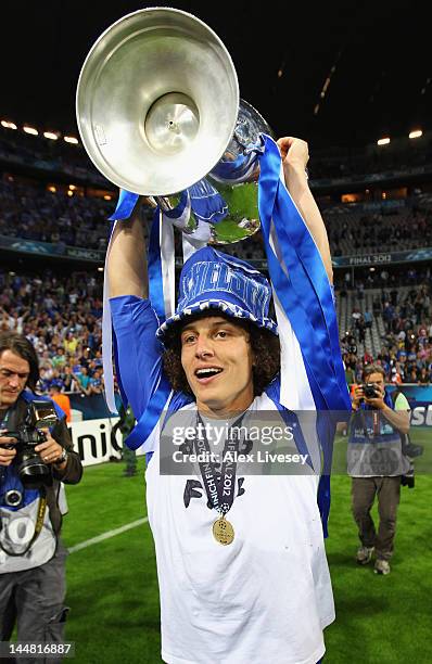 David Luiz of Chelsea lifts the trophy in celebration after their victory in the UEFA Champions League Final between FC Bayern Muenchen and Chelsea...