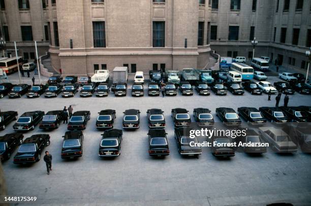 Elevated view of parked cars, belonging to various officials, in a courtyard at the Great Hall of the People, Tiananmen Square, Beijing, China, July...