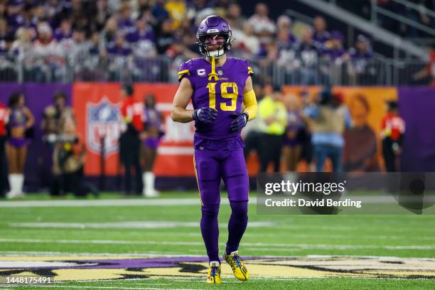 Adam Thielen of the Minnesota Vikings looks on against the New England Patriots in the second quarter of the game at U.S. Bank Stadium in...