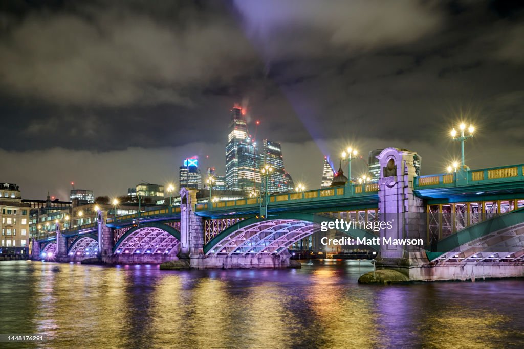 Panorama looking north east over Southwark Bridge to the city of London England UK