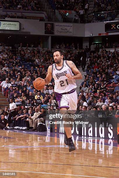 Vlade Divac of the Sacramento Kings dribbles the ball down the court versus the New Jersey Nets at the ARCO Arena in Sacramento, California. DIGITAL...