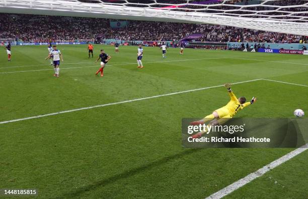 Aurelien Tchouameni of France scores the team's first goal past Jordan Pickford of England during the FIFA World Cup Qatar 2022 quarter final match...