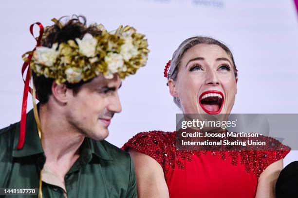 Piper Gilles and Paul Poirier of Canada react at the kiss and cry in the Ice Dance Free Dance during the ISU Grand Prix of Figure Skating Final at...