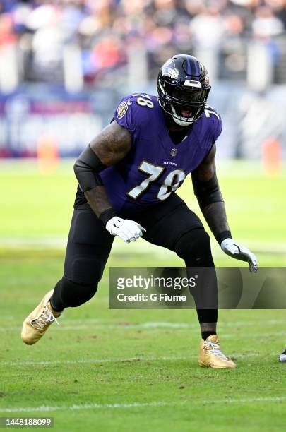 Morgan Moses of the Baltimore Ravens blocks against the Denver Broncos at M&T Bank Stadium on December 04, 2022 in Baltimore, Maryland.