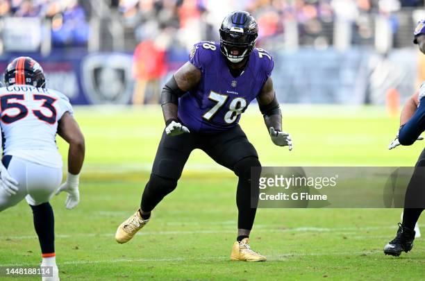 Morgan Moses of the Baltimore Ravens blocks against the Denver Broncos at M&T Bank Stadium on December 04, 2022 in Baltimore, Maryland.