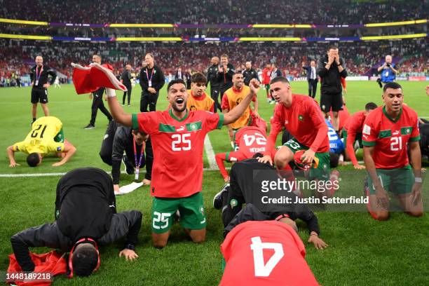 Yahya Attiat-Allah of Morocco celebrates with team mates after winning the FIFA World Cup Qatar 2022 quarter final match between Morocco/Spain and...
