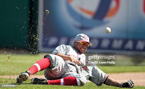 Jose Tabata of the Pittsburgh Pirates attempts to make the catch in foul territory during the game against the Detroit Tigers at Comerica Park on May...