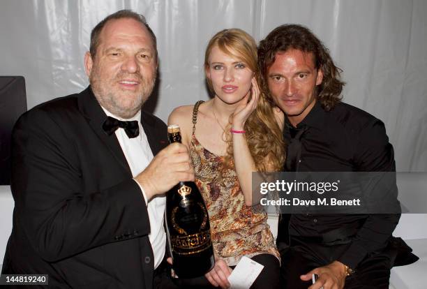 Harvey Weinstein, Eugenia Kuzmenko and Manuele Malenotti attend the 'Lawless' after party hosted by Manuele Malenotti, Johnnie Walker Blue Label and...