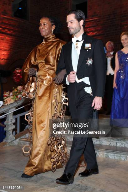 Phaedria Marie St.Hilaire and Prince Carl Philip of Sweden attend the Nobel Prize Banquet 2022 at Stockholm City Hall on December 10, 2022 in...