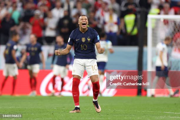 Kylian Mbappe of France celebrates after Harry Kane of England missing a penalty during the FIFA World Cup Qatar 2022 quarter final match between...