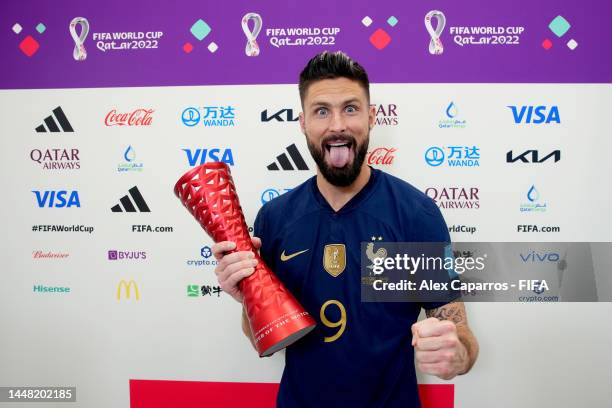 Olivier Giroud of France poses with the Budweiser Player of the Match Trophy following during the FIFA World Cup Qatar 2022 quarter final match...