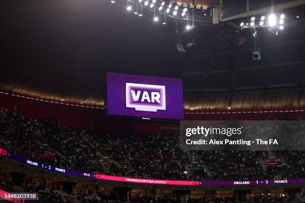 Screen inside the stadium displays a VAR check for a possible penalty during the FIFA World Cup Qatar 2022 quarter final match between England and...