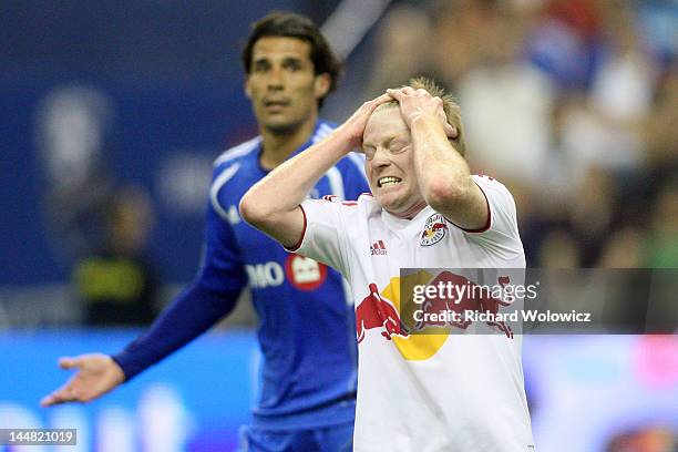 Dax McCarty of the New York Red Bulls reacts after missing an attempt during the MLS match against the Montreal Impact at the Olympic Stadium on May...