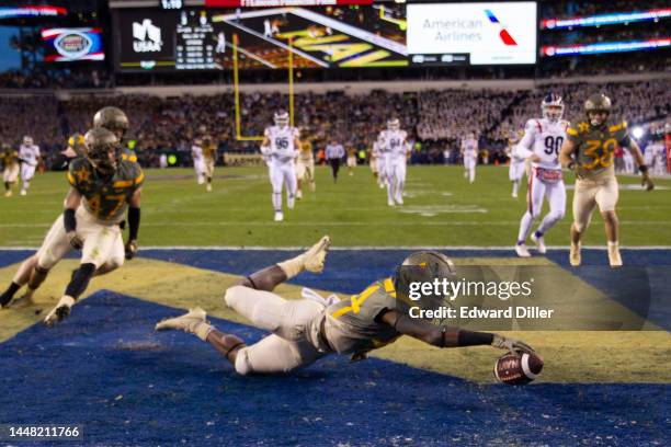 Jabril Williams of the Army Black Knights recovers a blocked punt for a touchdown at Lincoln Financial Field on December 10, 2022 in Philadelphia,...