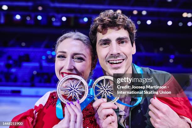 Piper Gilles and Paul Poirier of Canada pose in the Ice Dance medal ceremony during the ISU Grand Prix of Figure Skating Final at Palavela Arena on...