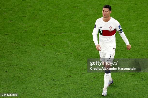 Cristiano Ronaldo of Portugal walks off the pitch after the team's defeat during the FIFA World Cup Qatar 2022 quarter final match between Morocco...