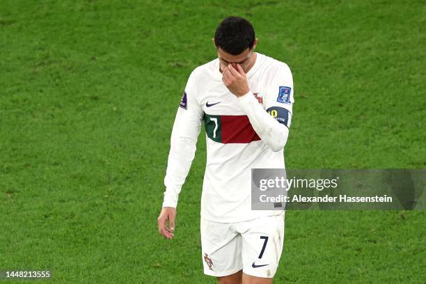 Cristiano Ronaldo of Portugal walks off the pitch after the team's defeat during the FIFA World Cup Qatar 2022 quarter final match between Morocco...