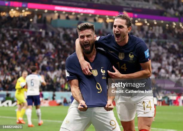 Olivier Giroud of France celebrates after scoring the team's second goal with Adrien Rabiot during the FIFA World Cup Qatar 2022 quarter final match...