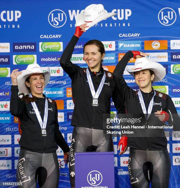 Ivanie Blondin, Isabelle Weidemann, and Valerie Maltais of team Canada on the podium for gold in Team Pursuit Women Division A during the ISU World...