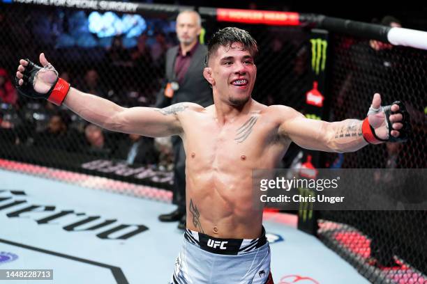 Brown reacts after defeating Erik Silva of Venezuela in a featherweight fight during the UFC 282 event at T-Mobile Arena on December 10, 2022 in Las...