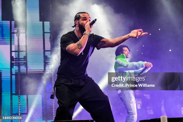 Drake and 21 Savage perform onstage during "Lil Baby & Friends Birthday Celebration Concert" at State Farm Arena on December 9, 2022 in Atlanta,...