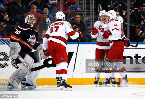 The Carolina Hurricanes celebrate a second period goal by Paul Stastny against Ilya Sorokin of the New York Islanders at the UBS Arena on December...