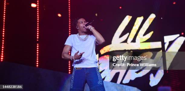 Rapper Lil Baby performs onstage during "Lil Baby & Friends Birthday Celebration Concert" at State Farm Arena on December 9, 2022 in Atlanta, Georgia.