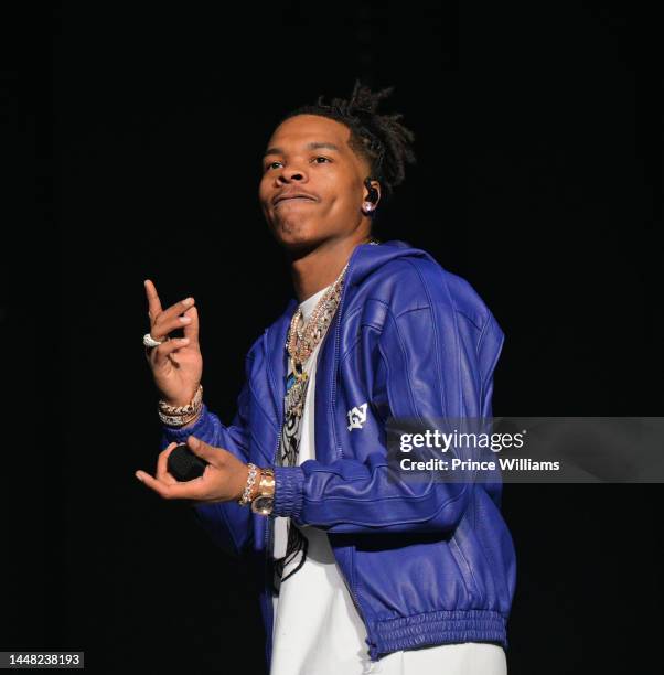 Rapper Lil Baby performs onstage during "Lil Baby & Friends Birthday Celebration Concert" at State Farm Arena on December 9, 2022 in Atlanta, Georgia.